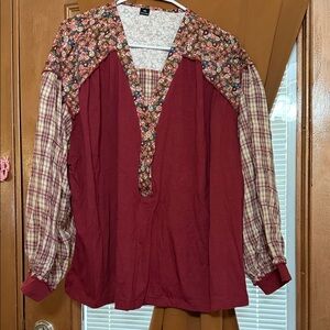 Long sleeve top nwot. Size xl. V neck, multiple patterns